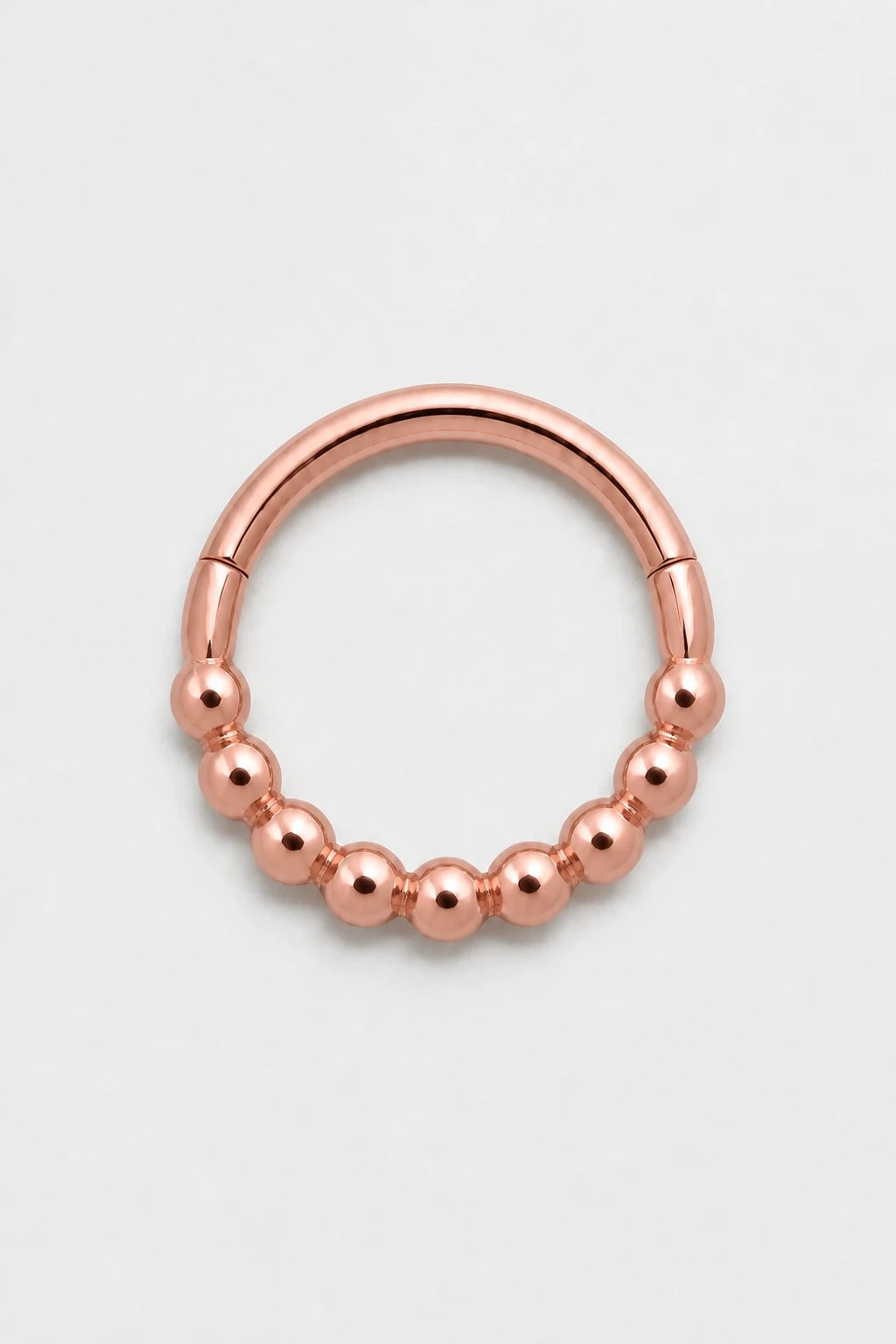 14k Gold Piercing Clicker mit Kugelstruktur · Rose Gold · Studio 1/3 Guided