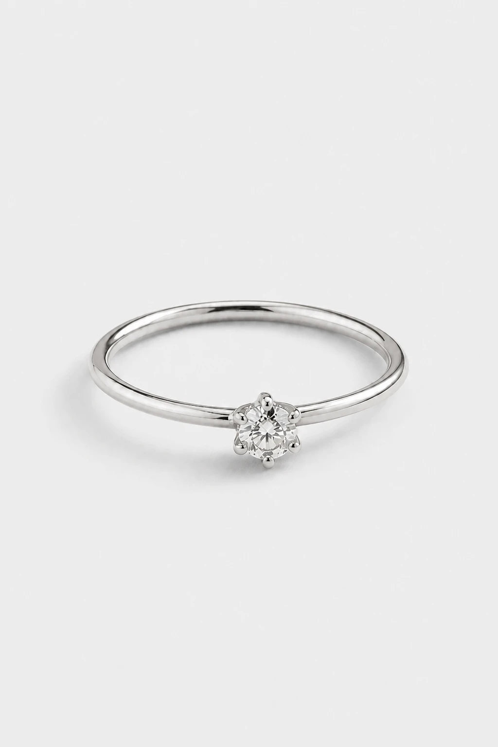 Six Prong Solitaire Ring · White Gold · Setup